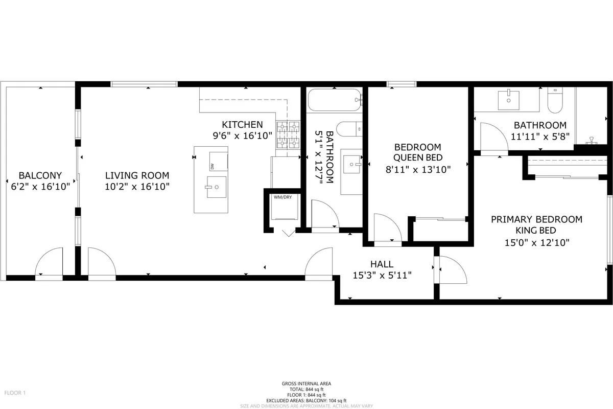 This image captures the open-plan living area of the condo, featuring a comfortable living room, a modern kitchen, and a balcony visible in the background. The natural light streaming in highlights the welcoming, communal feel of the space, and the balcony suggests easy indoor-outdoor living.
